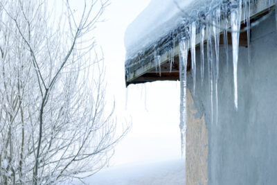 large icicles hanging from the roof
