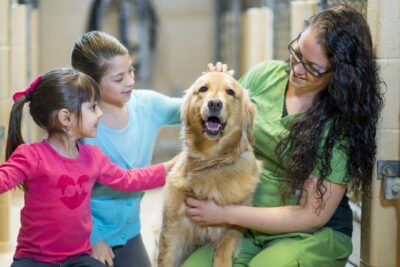 Family with pet dog