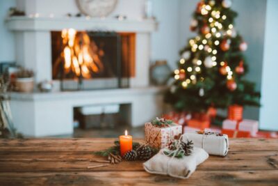 Christmas Tree beside A Fireplace